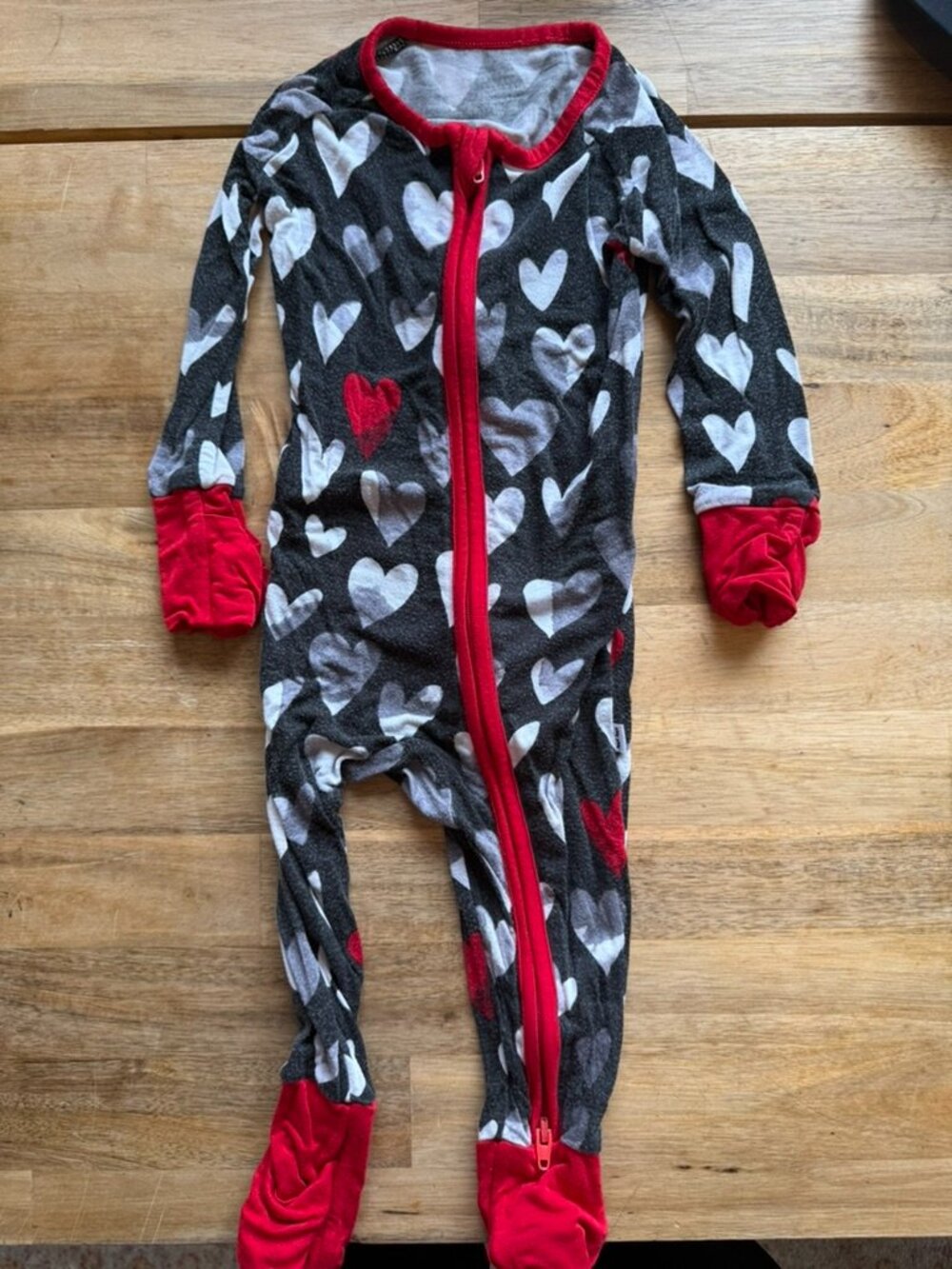 Little sleepies black and red hearts zippy 3-6 month